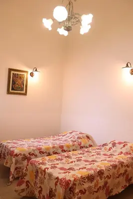 Letto o letti in una camera di Evelyn guest house