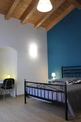 Letto o letti in una camera di Du Home
