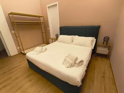 Letto o letti in una camera di Sicily Home Fata Azzurra