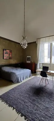 Letto o letti in una camera di Casa Mongibello Sicilia, 100 square meters