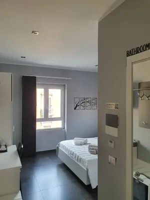 Letto o letti in una camera di Luca's Garden B&B in Catania