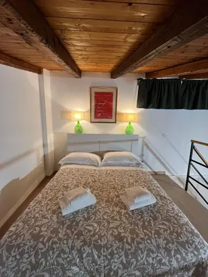 Letto o letti in una camera di Donna Mariù