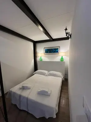 Letto o letti in una camera di Donna Mariù