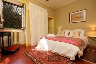 Letto o letti in una camera di VILLA VISCALORI A garden with pool and see view near Etna