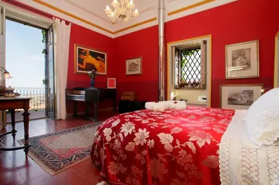 Letto o letti in una camera di VILLA VISCALORI A garden with pool and see view near Etna
