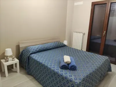 Letto o letti in una camera di Villa Clarentina old