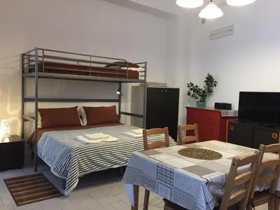 Letto o letti in una camera di Zafferana Lavica Apartment