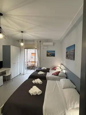 Letto o letti in una camera di Le Ciminiere Rooms