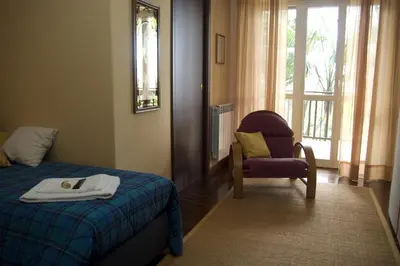 Letto o letti in una camera di La Cittadella Residence Città Universitaria Policlinico Catania
