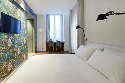 Letto o letti in una camera di Cozy Studio in Catania, 40 m², with air conditioning