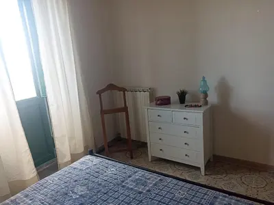Letto o letti in una camera di Casa Agrumeto in Nunziata