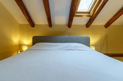 Letto o letti in una camera di Electra House