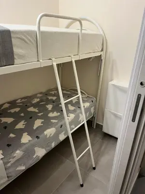 Letto o letti in una camera di Little House On The Sea