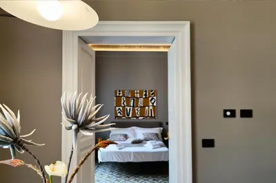 Letto o letti in una camera di L'Opificio Siciliano Boutique Apartments
