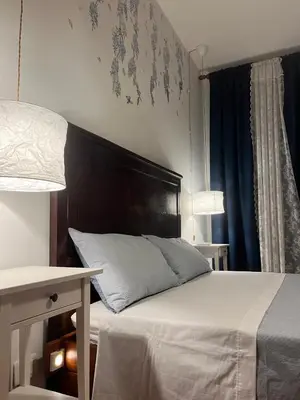 Letto o letti in una camera di Casa Malù