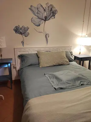 Letto o letti in una camera di Casa Malù