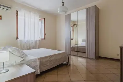 Letto o letti in una camera di Spacious Apartment with Sea View in Aci Castello