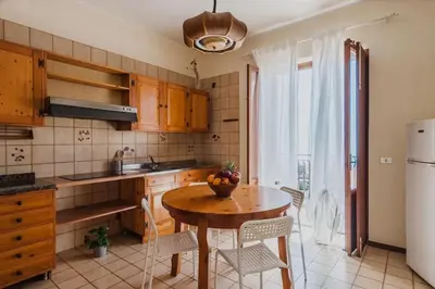 Cucina o angolo cottura di Spacious Apartment with Sea View in Aci Castello