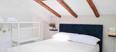 Letto o letti in una camera di La tirrazza