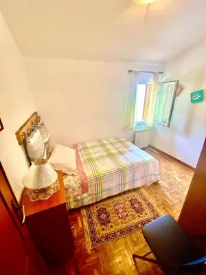Letto o letti in una camera di Casa La Vigna