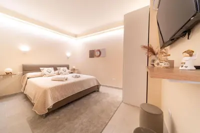 TV o dispositivi per l'intrattenimento presso Desiree Luxury House- vasca idromassaggio