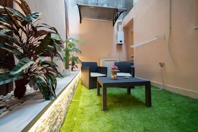 Area soggiorno di Desiree Luxury House- vasca idromassaggio