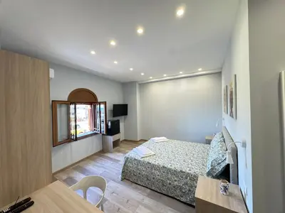 Letto o letti in una camera di Casa Calipso