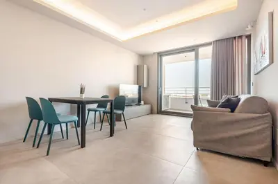 Area soggiorno di Viewport Catania-Sea View Terrace-4Guests Apt