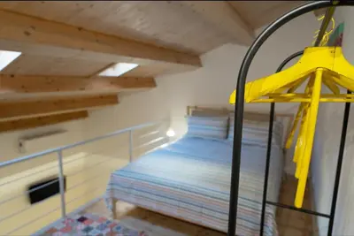 Letto o letti in una camera di La Chiocciola