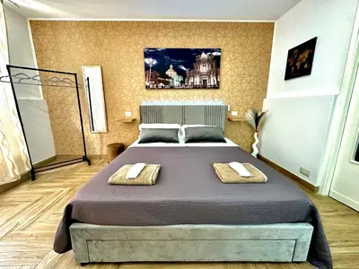 Letto o letti in una camera di Liotru Catanese - House