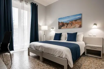 Letto o letti in una camera di Savio House