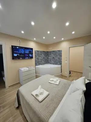 Letto o letti in una camera di Chiazzette Elegant Home
