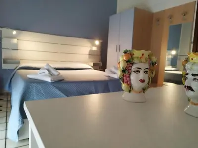 Letto o letti in una camera di B&B Villa Martoglio