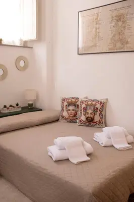 Letto o letti in una camera di Alessandro Manzoni Apartments - Exclusive brand 