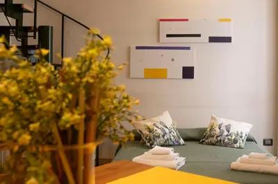 Area soggiorno di Alessandro Manzoni Apartments - Exclusive brand 