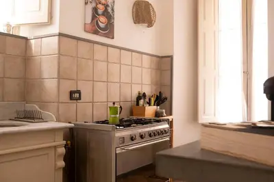 Cucina o angolo cottura di Alessandro Manzoni Apartments - Exclusive brand 