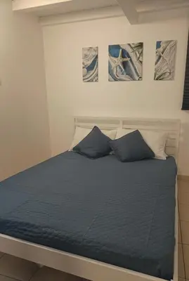 Letto o letti in una camera di Casa Elinda