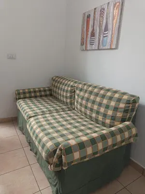 Letto o letti in una camera di Casa Elinda