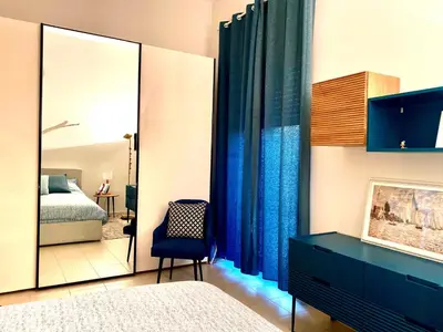 Letto o letti in una camera di CalmaHouse