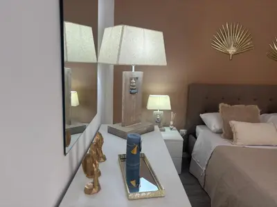 Letto o letti in una camera di Francesco Home Catania