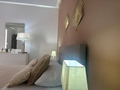Letto o letti in una camera di Francesco Home Catania