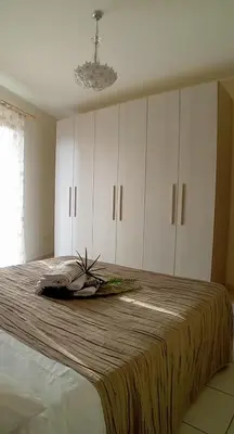 Letto o letti in una camera di Sicilia in cartolina