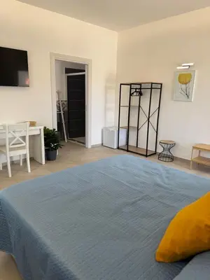 Letto o letti in una camera di Casa MaLù