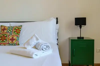 Letto o letti in una camera di Terrazza Lavica, free parking
