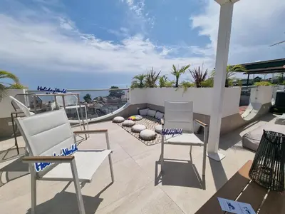 Area soggiorno di Tropicalia Suites