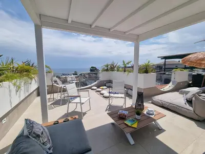 Area soggiorno di Tropicalia Suites
