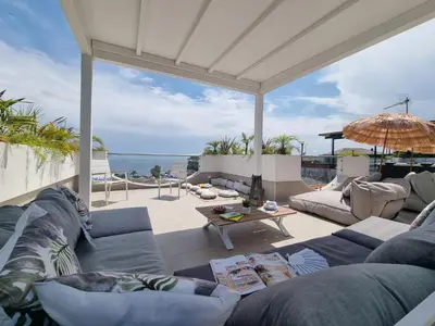 Area soggiorno di Tropicalia Suites