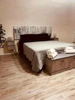 Letto o letti in una camera di Giupa's home