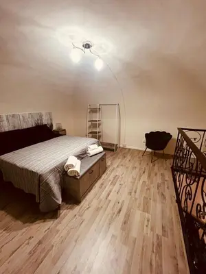 Letto o letti in una camera di Giupa's home