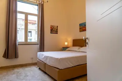 Letto o letti in una camera di Domus Lavica by Sicily in Home